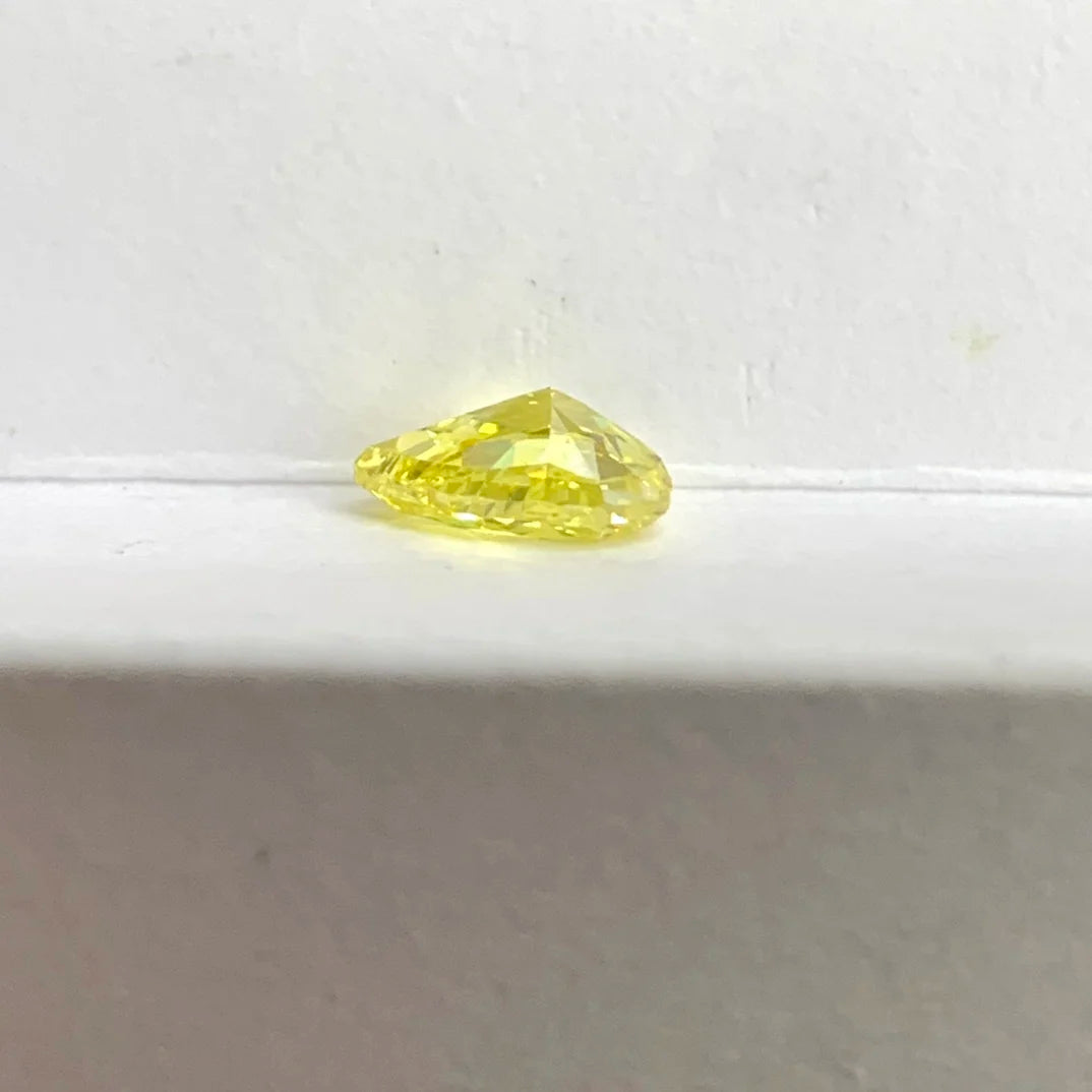 1.12ct Lab Grown Diamond Pear Shape Fancy Vivid Yellow HPHT VS1 IGI Certificate